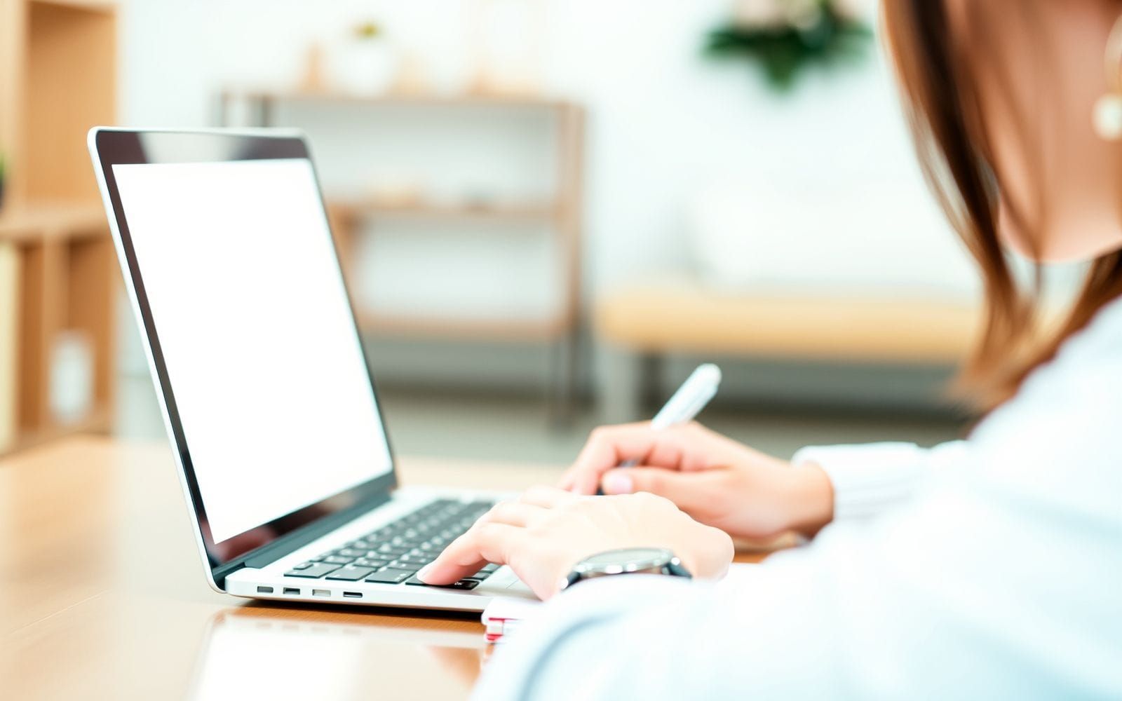 Person researching how to find profitable affiliate marketing niches on a laptop.